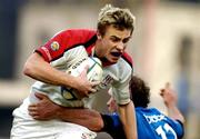 4 December 2004; Tommy Bowe, Ulster, is tackled by Brian Liebenberg, Stade Francais. Heineken European Cup 2004-2005, Pool 6, Round 3, Stade Francais v Ulster, Stade Jean Bouin, Paris, France. Picture credit; Brian Lawless / SPORTSFILE