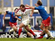 4 December 2004; Rod Moore, Ulster, in action against Olivier Brouzet, Stade Francais. Heineken European Cup 2004-2005, Pool 6, Round 3, Stade Francais v Ulster, Stade Jean Bouin, Paris, France. Picture credit; Brian Lawless / SPORTSFILE