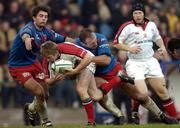 4 December 2004; Paul Steinmetz, Ulster, is tackled by Pierre Rabadan, left, and Olivier Brouzet, Stade Francais. Heineken European Cup 2004-2005, Pool 6, Round 3, Stade Francais v Ulster, Stade Jean Bouin, Paris, France. Picture credit; Brian Lawless / SPORTSFILE