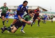 4 December 2004; Conor O'Loughlin, Connacht, goes over to score a try despite the attentions of Ali Koko, Montpellier. European Challenge Cup 2004-2005, Connacht v Montpellier, Sportsground, Galway. Picture credit; Damien Eagers / SPORTSFILE