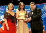 4 December 2004; Mary Leacy of Wexford is presented with her All-Star award by Minister for Finance, Brian Cowen TD, and Miriam O'Callaghan, President of Cumann Camogaiochta na nGael, at the 2004 Camogie All-Star Awards. Citywest Hotel, Dublin. Picture credit; Brendan Moran / SPORTSFILE