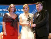 4 December 2004; Therese Brophy of Tipperary is presented with her All-Star award by Minister for Finance, Brian Cowen TD, and Miriam O'Callaghan, President of Cumann Camogaiochta na nGael, at the 2004 Camogie All-Star Awards. Citywest Hotel, Dublin. Picture credit; Brendan Moran / SPORTSFILE