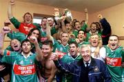 5 December 2004;  Ballina Stephenites players and officials, celebrate in their team dressing room at the end of the game after victory over Killererin. AIB Connacht Club Senior Football Final, Ballina Stephenites v Killererin, James Stephen's Park, Ballina, Co. Mayo. Picture credit; David Maher / SPORTSFILE