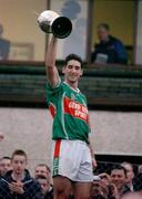 5 December 2004; Brian Ruane, Ballina Stephenites captain, lifts the trophy after victory over Killererin. AIB Connacht Club Senior Football Final, Ballina Stephenites v Killererin, James Stephen's Park, Ballina, Co. Mayo. Picture credit; David Maher / SPORTSFILE