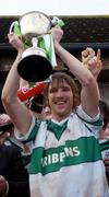 5 December 2004; Colm Parkinson, Portlaoise, lifts the Sean McCabe cup. AIB Leinster Club Senior Football Final, Portlaoise v Skyrne, St. Conleth's Park, Newbridge, Co. Kildare. Picture credit; Ray McManus / SPORTSFILE