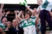 5 December 2004; Colm Parkinson, Portlaoise, lifts the Sean McCabe cup. AIB Leinster Club Senior Football Final, Portlaoise v Skyrne, St. Conleth's Park, Newbridge, Co. Kildare. Picture credit; Ray McManus / SPORTSFILE