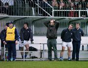 5 December 2004; John McDermott, Skyrne, 3rd from right, who took no part, shows his disappointment near the end of the game . AIB Leinster Club Senior Football Final, Portlaoise v Skyrne, St. Conleth's Park, Newbridge, Co. Kildare. Picture credit; Ray McManus / SPORTSFILE