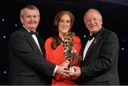9 November 2013; Gráinne McNally, Monaghan, is presented with her TG4 Ladies Football All-Star Award by Pat Quill, President of the Ladies Gaelic Football Association, in the company of Pól O Gallchóir, left, Ceannsaí, TG4. TG4 Ladies Football All-Star Awards 2013, Citywest Hotel, Saggart, Co. Dublin. Picture credit: Brendan Moran / SPORTSFILE