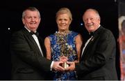 9 November 2013; Deirdre O'Reilly, Cork, is presented with her TG4 Ladies Football All-Star Award by Pat Quill, President of the Ladies Gaelic Football Association, in the company of Pól O Gallchóir, left, Ceannsaí, TG4. TG4 Ladies Football All-Star Awards 2013, Citywest Hotel, Saggart, Co. Dublin. Picture credit: Brendan Moran / SPORTSFILE