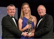 9 November 2013; Cora Staunton, Mayo, is presented with her TG4 Ladies Football All-Star Award by Pat Quill, President of the Ladies Gaelic Football Association, in the company of Pól O Gallchóir, left, Ceannsaí, TG4. TG4 Ladies Football All-Star Awards 2013, Citywest Hotel, Saggart, Co. Dublin. Picture credit: Brendan Moran / SPORTSFILE
