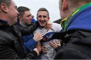 10 November 2013; St Vincent's Jarlath Curley celebrates with supporters after the game. AIB Leinster Senior Club Football Championship, Quarter-Final, St Loman's, Westmeath v St Vincent's, Dublin. Cusack Park, Mullingar, Co. Westmeath. Picture credit: Pat Murphy / SPORTSFILE
