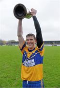 10 November 2013; Niall Gilligan, Sixmilebridge, lifts the Canon Hamilton Cup following victory over Newmarket-on-Fergus. Clare County Senior Club Hurling Championship Final, Sixmilebridge v Newmarket-on-Fergus. Cusack Park, Ennis, Co. Clare. Picture credit: Stephen McCarthy / SPORTSFILE