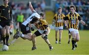 10 November 2013; Sean O'Hanlon, Kilcoo Owen Roes, tackled by Kyle Brennany, Crossmaglen Rangers. AIB Ulster Senior Club Football Championship, Quarter-Final Replay, Kilcoo Owen Roes, Down v Crossmaglen Rangers, Armagh. Athletic Grounds, Armagh. Picture credit: Oliver McVeigh / SPORTSFILE