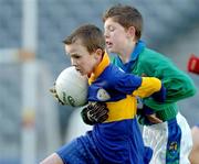 7 December 2004; Ben Conroy, St. Patrick's BNS, in action against Alan Reynolds, Pope John Paul II School. 2004 Allianz Cumann na mBunscoil Finals, St. Patrick's BNS, Drumcondra v Pope John Paul II Senior Boys School, Malahide, Croke Park, Dublin. Picture credit; Pat Murphy / SPORTSFILE