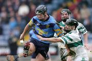 31 October 2004; Bryan Phelan, UCD, in action against Brian Mulligan, Portlaoise. AIB Leinster Club Hurling Championship, Portlaoise v UCD, O'Moore Park, Portlaoise, Co. Laois. Picture credit; Ray McManus / SPORTSFILE