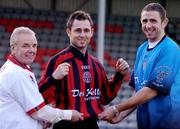 8 December 2004; Bohemians new signing Des Byrne, centre, gets some help with his jersey from Bohemians manager Gareth Farrelly, right, and Des Kelly of Des Kelly Interiors at the announcement by Bohemians FC of new signing Des Byrne and a new two-year contract with Des Kelly Interiors. Dalymount Park, Dublin. Picture credit; Brian Lawless / SPORTSFILE