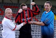 8 December 2004; Bohemians new signing Des Byrne, centre, gets some help with his jersey from Bohemians manager Gareth Farrelly and Des Kelly of Des Kelly Interiors, left, at the announcement by Bohemians FC of new signing Des Byrne and a new two-year sponsorship deal with Des Kelly Interiors. Dalymount Park, Dublin. Picture credit; Brian Lawless / SPORTSFILE