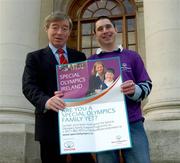 8 December 2004; Special Olympics athlete Paddy Ellis with the Minister for Social and Family Affairs Seamus Brennan TD at the launch of the Special Olympics Ireland Family Support Programme Information Guide. Leinster House, Dublin. Picture credit; Pat Murphy / SPORTSFILE