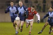 10 December 2004; Colm Kearney, Louth, in action against Dublin's, from left, Senan Connell, Robbie Boyle and David Henry. Senior Football Charity Challenge, Dublin v Louth, Parnell Park, Dublin. Picture credit; Damien Eagers / SPORTSFILE