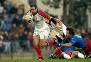 4 December 2004; Kevin Maggs, Ulster, goes past the tackle of Shaun Sowerby, Stade Francais. Heineken European Cup 2004-2005, Pool 6, Round 3, Stade Francais v Ulster, Stade Jean Bouin, Paris, France. Picture credit; Brian Lawless / SPORTSFILE