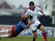 11 December 2004; David Humphreys, Ulster, is tackled by David Skrela, Stade Francais. Heineken European Cup 2004-2005, Pool 6, Round 4, Ulster v Stade Francais, Ravenhill, Belfast. Picture credit; Matt Browne / SPORTSFILE