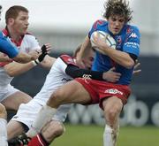 11 December 2004; Brian Liebenberg, Stade Francais, is tackled by Tommy Bowe, Ulster. Heineken European Cup 2004-2005, Pool 6, Round 4, Ulster v Stade Francais, Ravenhill, Belfast. Picture credit; Matt Browne / SPORTSFILE