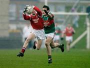 12 December 2004; Trevor Costello, Stradbally, in action against Peter O'Dwyer, Kilmurry-Ibrickane. AIB Munster Club Senior Football Final Replay, Stradbally v Kilmurry-Ibrickane, John Fitzgerald Park, Kilmallock, Co. Limerick. Picture credit; Matt Browne / SPORTSFILE