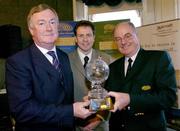 14 December 2004; Mr. John O'Donoghue TD, Minister of Arts, Sport and Tourism, presents the European Golf Resort of the Year Trophy to Denis Kane, Chief Executive Druids Glen Golf Resort, right, with Peter Walton, centre, Chief Executive International Association Golf Tour Operators. Shelbourne Hotel, Dublin. Picture Credit; David Maher / SPORTSFILE