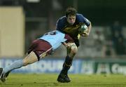10 December 2004; Malcolm O'Kelly, Leinster, is tackled by Glenn Davis, Bourgoin. Heineken European Cup 2004-2005, Pool 2, Round 4, Bourgoin v Leinster, Bourgoin-Jailleau, France. Picture credit; Brendan Moran / SPORTSFILE