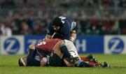 11 December 2004; Alessio Galasso, Castres Olympique, (on ground), tussles with Munster's Paul O'Connell, before being sent off by referee Roy Maybank. Heineken European Cup 2004-2005, Pool 4, Round 4, Munster v Castres Olympique, Thomond Park, Limerick. Picture credit; Brendan Moran / SPORTSFILE