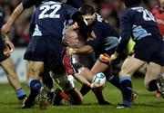 11 December 2004; Peter Stringer, Munster, is tackled by Alessio Galasso, Castres Olympique. Heineken European Cup 2004-2005, Pool 4, Round 4, Munster v Castres Olympique, Thomond Park, Limerick. Picture credit; Damien Eagers / SPORTSFILE