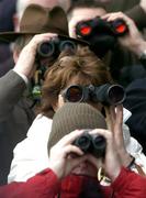 12 December 2004; Racegoers watch on during the Giltspur Scientific Tara Hurdle. Navan Raceourse, Navan, Co. Meath. Picture Credit; David Maher / SPORTSFILE