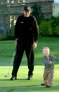 15 December 2004; Padraig Harrington watches his 16 month old son Paddy take a swing during a photocall to launch the Padraig Harrington Charitable Foundation and to provide details of the staging of The Padraig Harrington Charity Golf Show. Citywest Hotel, Dublin. Picture credit; Pat Murphy / SPORTSFILE