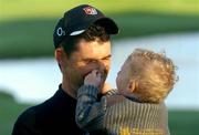 15 December 2004; Paddy Harrington twists his father Padraig's nose at a photocall to launch the Padraig Harrington Charitable Foundation and to provide details of the staging of The Padraig Harrington Charity Golf Show. Citywest Hotel, Dublin. Picture credit; Pat Murphy / SPORTSFILE