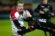 17 December 2004; Tommy Bowe, Ulster, in action against Derrick Lee, Edinburgh Rugby. Celtic League 2004-2005, Pool 1, Ulster v Edinburgh Rugby, Ravenhill, Belfast. Picture Credit; SPORTSFILE