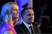 8 November 2013; Clare manager Davy Fitzgerald and presenter Clare McNamara watch a video during the 2013 GAA GPA All-Star awards, sponsored by Opel. GAA GPA All-Star Awards 2013 Sponsored by Opel, Croke Park, Dublin. Picture credit: Brendan Moran / SPORTSFILE