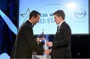 8 November 2013; Clare's Tony Kelly is presented with the 2013 GAA GPA Young Hurler of the Year award, sponsored by Opel, by former Tipperary hurler Brendan Cummins. GAA GPA All-Star Awards 2013 Sponsored by Opel, Croke Park, Dublin. Picture credit: Brendan Moran / SPORTSFILE