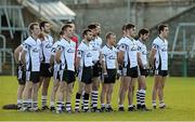 10 November 2013; The Kilcoo Owen Roes team stand for the National Anthem. AIB Ulster Senior Club Football Championship, Quarter-Final Replay, Kilcoo Owen Roes, Down v Crossmaglen Rangers, Armagh. Athletic Grounds, Armagh. Picture credit: Oliver McVeigh / SPORTSFILE