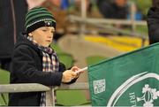 9 November 2013; Ronan Keyes age 7 from Carrick-On-Suir, Co. Tipperary, watches the Ireland warm-up before the game. Guinness Series International, Ireland v Samoa, Aviva Stadium, Lansdowne Road, Dublin. Picture credit: Barry Cregg / SPORTSFILE