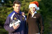 20 December 2004; Leinster's David Holwell who was named Guinness Draught Can Celtic League Player of the Month for November with model Glenda Gilson. Picture credit; Brendan Moran / SPORTSFILE