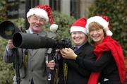 23 December 2004; Mary Davis, Director, Special Olympics Ireland, Dermot O'Shea, Art Director, Midsummer Magic and Special Olympics Athlete Brian Keogh, from Raheny, Dublin, at the presentation of a cheque for €35,000 being the proceeds from the sale of 'Midsummer Magic', a collection of images from the 2003 World Special Olympics Games as photographed by the press photographers of Ireland. Picture credit; Ray McManus / SPORTSFILE