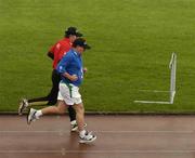 25 December 2004; Former World 5,000 meters champion Eamonn Coghlan and the Republic of Ireland manager Brian Kerr stride it out during one of the many 'Goal Mile' races on Christmas Day. Annual Goal Mile, Belfield, Dublin. Picture credit; Ray McManus / SPORTSFILE