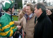 27 December 2004; Winning jockey Conor O'Dwyer in conversation with owner JP McManus, right, and Frank Morris, trainer, centre, after keepatem had won the Paddy Power Steeplechase. Leopardstown Racecourse, Dublin. Picture credit; Pat Murphy / SPORTSFILE
