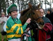 27 December 2004; Jockey Conor O'Dwyer in jovial mood with Keepatem after winning the Paddy Power Steeplechase. Leopardstown Racecourse, Dublin. Picture credit; Pat Murphy / SPORTSFILE