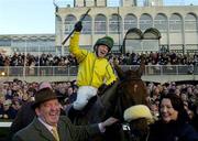 28 December 2004; A delighted Paul Carberry celebrates with trainer Michael Hourigan, left and Kay Hourigan after winning the Lexus Steeplechase on Beef or Salmon. Leopardstown Racecourse, Dublin. Picture credit; Matt Browne / SPORTSFILE