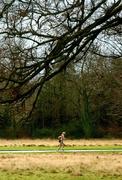 1 January 2005; An athlete in action during the Tom Brennan Memorial 5K Road Race, Phoenix Park, Dublin. Picture credit; Pat Murphy / SPORTSFILE