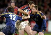 1 January 2005; Rob Henderson, Munster, in action against Gordon D'Arcy (12) and Eric Miller, Leinster. Celtic League 2004-2005, Pool 1, Munster v Leinster, Musgrave Park, Cork. Picture credit; Brendan Moran / SPORTSFILE