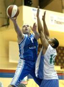 2 January 2005; Stephen McCarthy, Neptune, in action against Charron Watson, Killarney Lakers. Basketball Ireland Men's National Cup Quarter-final, Neptune v Killarney Lakers, Neptune Stadium, Cork. Picture credit; Brendan Moran / SPORTSFILE