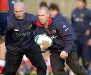 4 January 2005; Peter Stringer in action with Paul Burke, left, during Munster rugby squad training. Thomond Park, Limerick. Picture credit; Matt Browne / SPORTSFILE