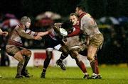 7 January 2005; Marcel Garvey, Gloucester, supported by team-mate Andy Hazell, left, is tackled by Neil Best, right, Ulster. Heineken European Cup 2004-2005, Round 5, Pool 6, Ulster v Gloucester, Ravenhill, Belfast. Picture credit; Matt Browne / SPORTSFILE